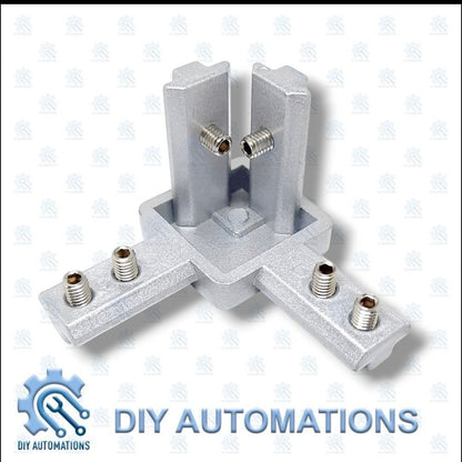 DIY Automations silver aluminum 3-way corner connector bracket for 20mm extrusions, with set screws.