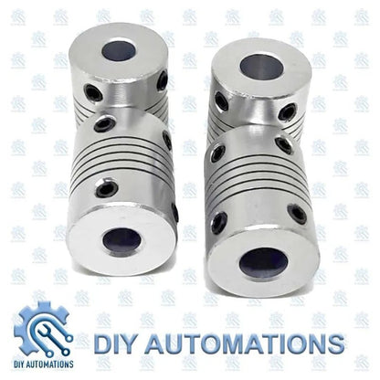 DIY Automations silver flexible coupling D19-25-6.35-8, aluminum, with ribbed body and set screws.