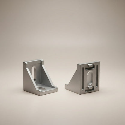 DIY AUTOMATIONSH silver aluminum corner bracket for 30x30 extrusions, L-shaped with slot for secure connection.