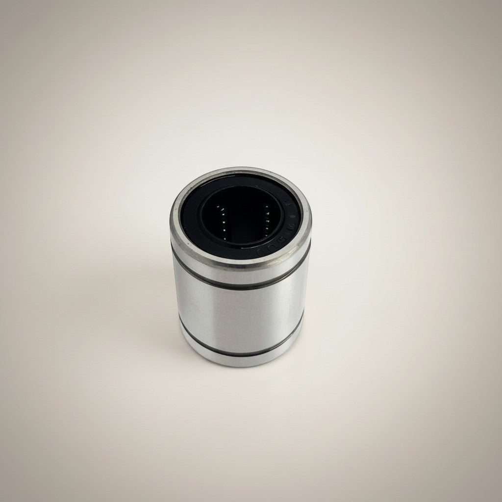 DIY AUTOMATION LM 25UU linear bearing, silver metal exterior with black interior and visible ball bearings for smooth motion.
