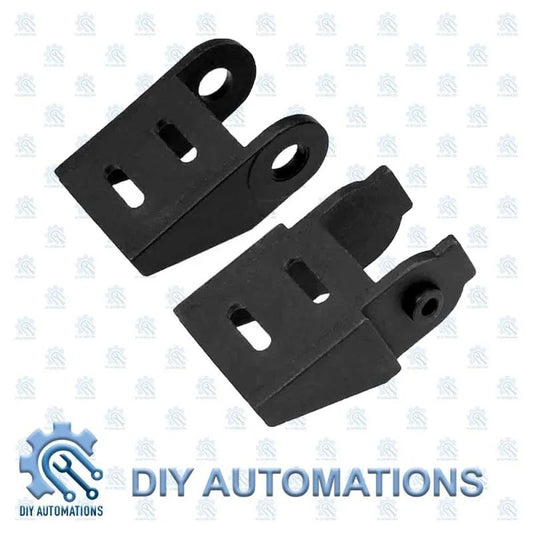 DIY Automations black metal drag chain head mounting brackets with slotted holes and eyelet ends for automation projects.
