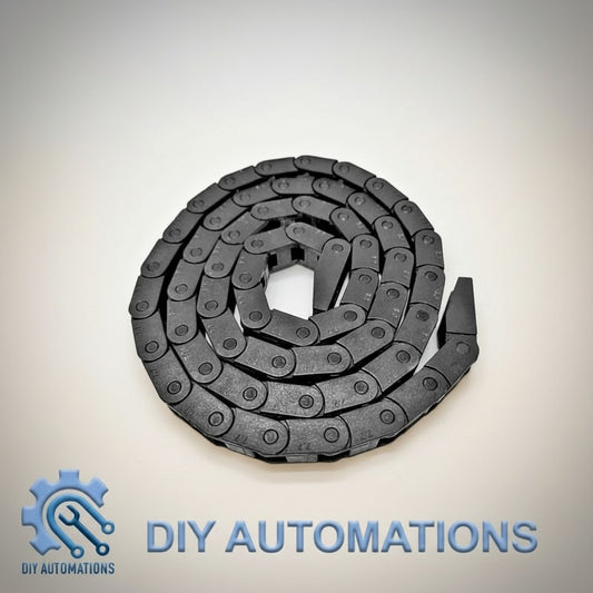 DIY Automations black plastic 7x7 mini drag chain for cable management, coiled on a white background.