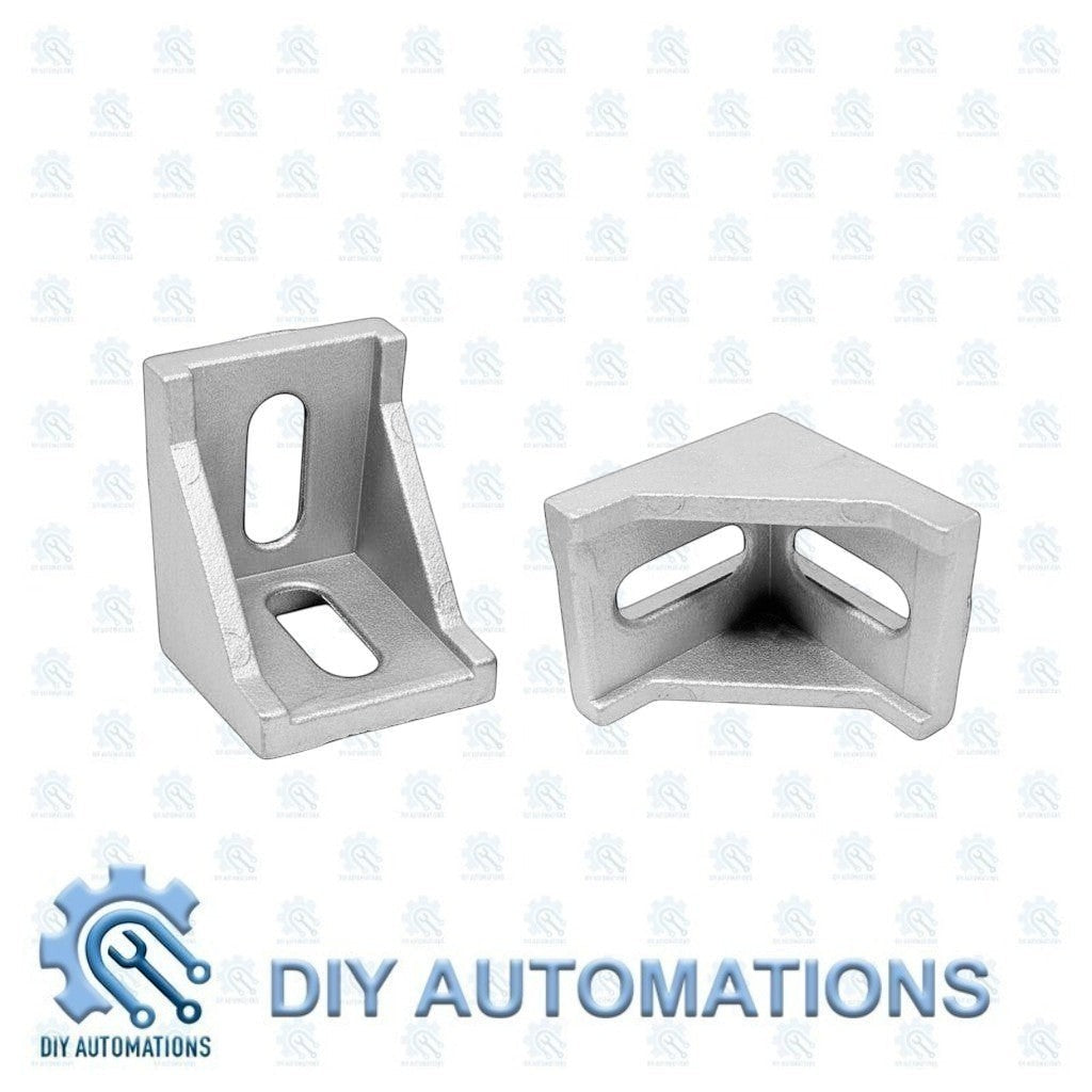 DIY Automations silver aluminum corner bracket for 20mm extrusion systems, 40x40 size, with slotted holes for M5/M6 bolts.